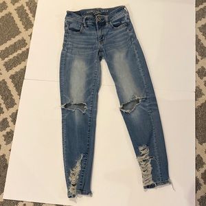 American Eagle Next Level Destructed Stretch Jeans